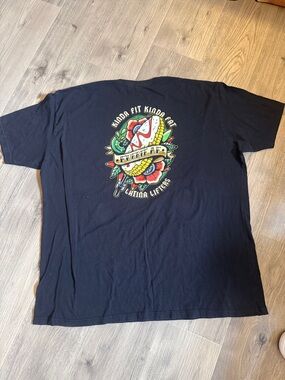 Black Short-Sleeve Graphic Tee with Colorful Retro Tattoo Print